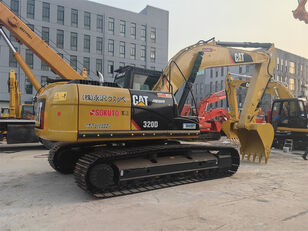 excavator dengan track Caterpillar 320D