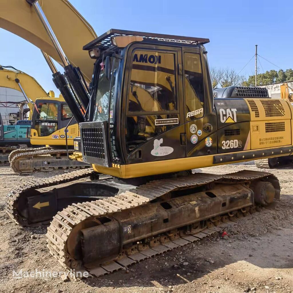 excavator dengan track Caterpillar 326D