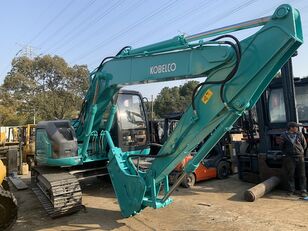excavator dengan track KOBELCO SK135