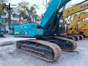 excavator dengan track Kobelco SK200