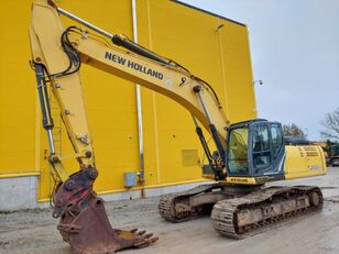 excavator dengan track New Holland New Holland E385C